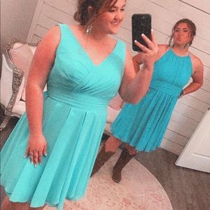 Turquoise bridesmaid dress.